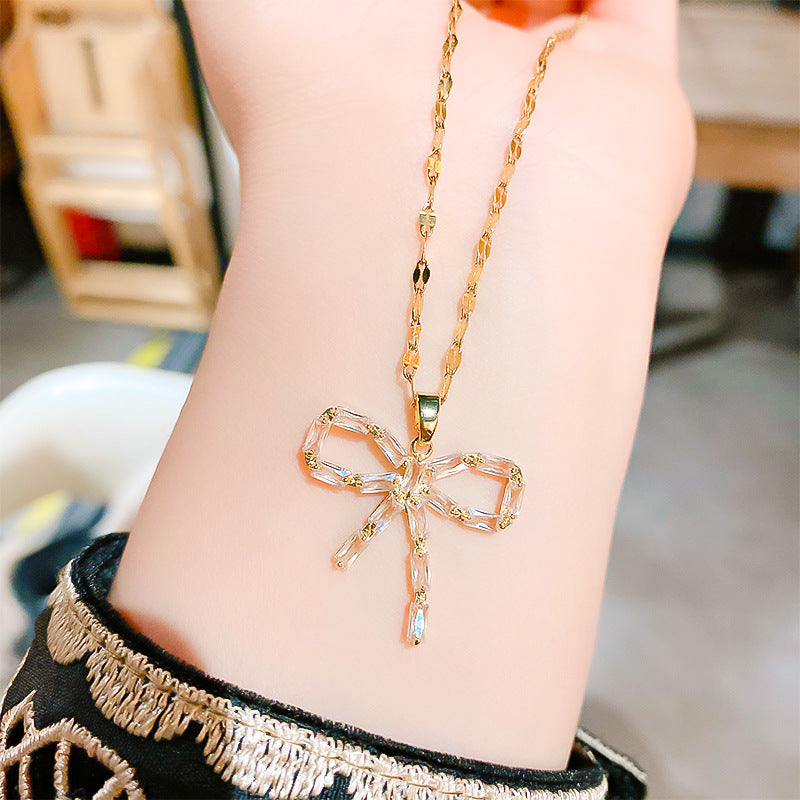 Wholesale 12pcs/pack Titanium Steel Bow Pendant Necklace Earring Set