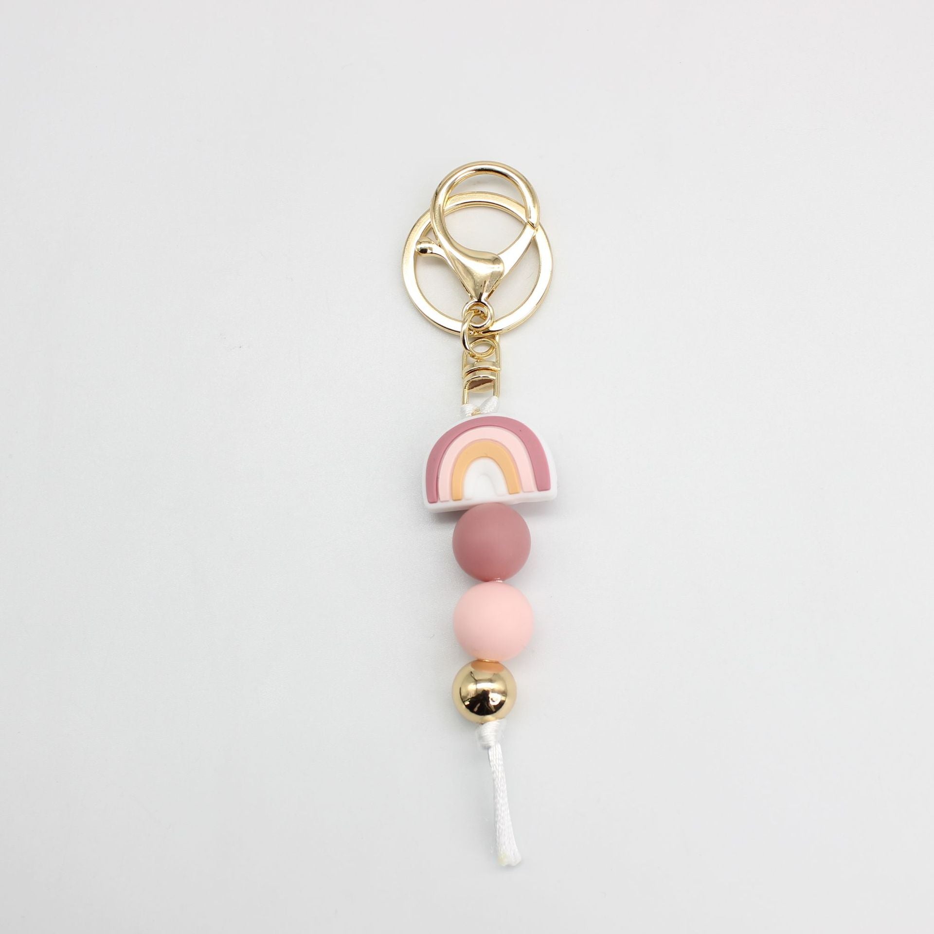 Venta al por mayor Llavero Con Cuentas De Silicona Arco Iris
