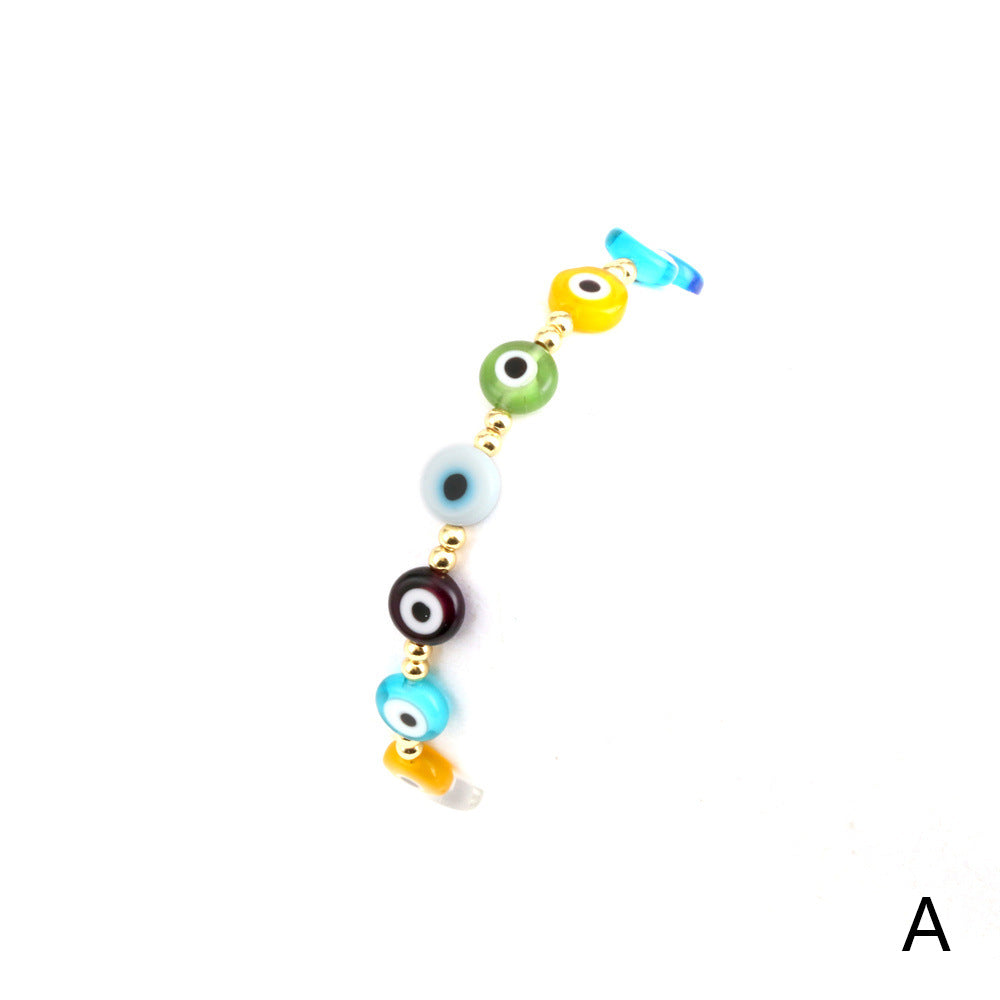 Venta al por mayor Pulsera De Cristal De Color Mezclado De Globo Ocular