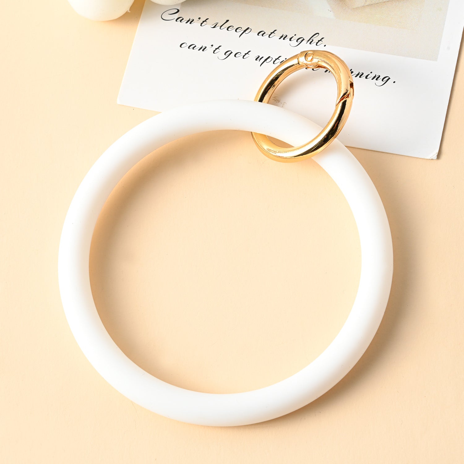 Venta al por mayor Llavero Redondo De Muñeca De Silicona