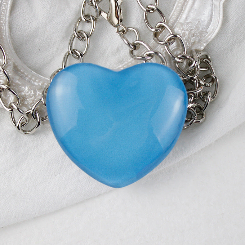 Soporte de teléfono de vidrio de corazón pequeño de melocotón al por mayor