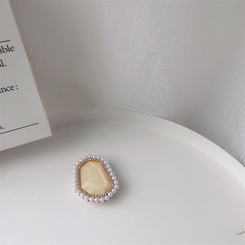 Venta al por mayor Soporte para teléfono móvil de perlas de piedras preciosas