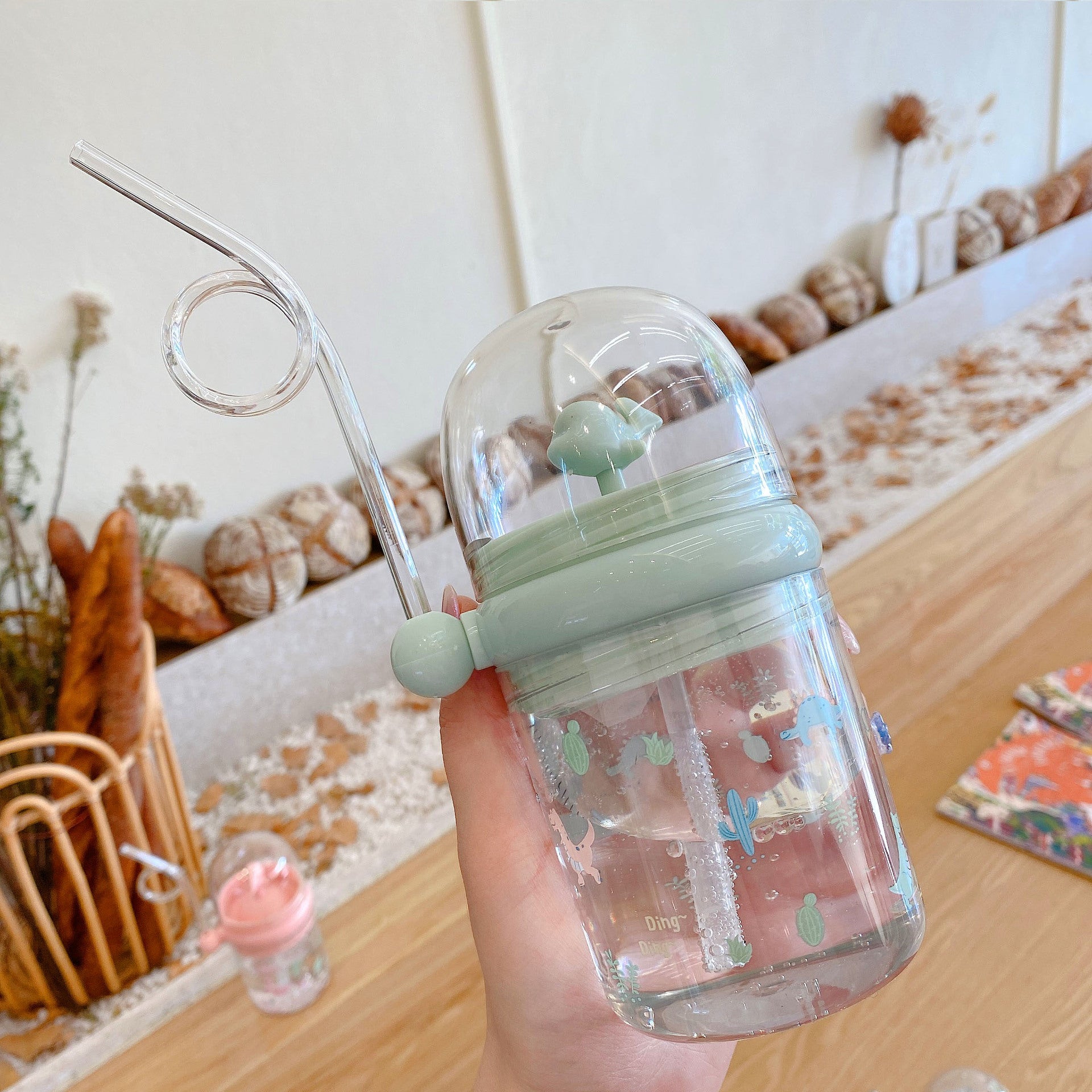 Wholesale Water spray whale cup children's portable anti-fall plastic cup with scale windmill