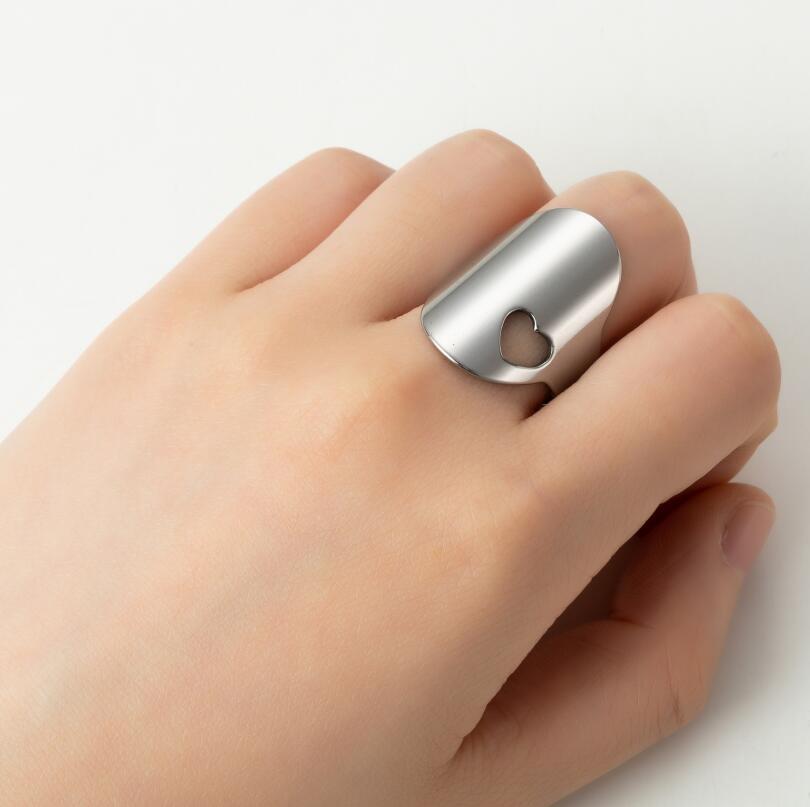 Anillos Cruzados De Corazones De Titanio al por mayor