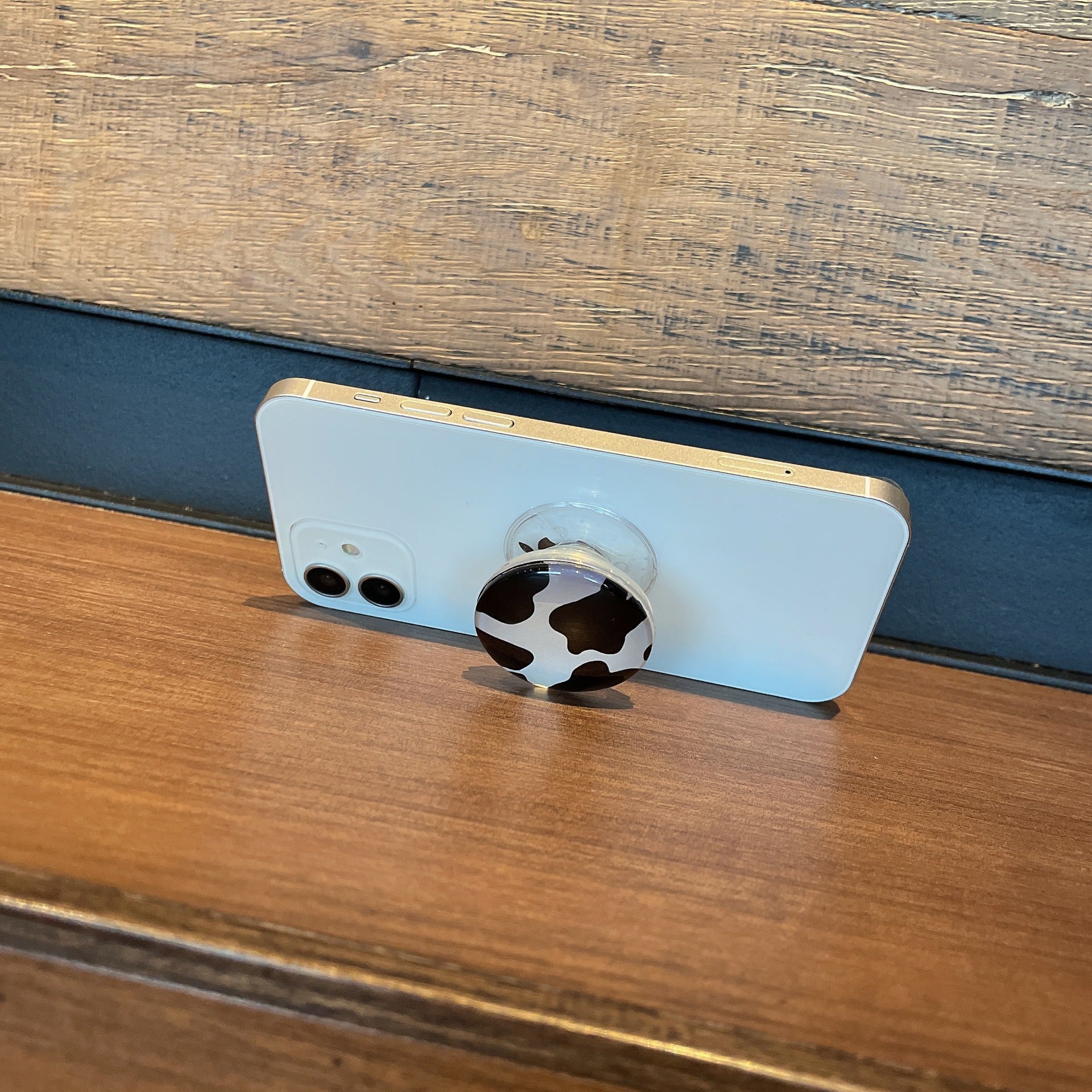 Venta al por mayor Soporte ámbar plegable de vidrio para teléfono móvil