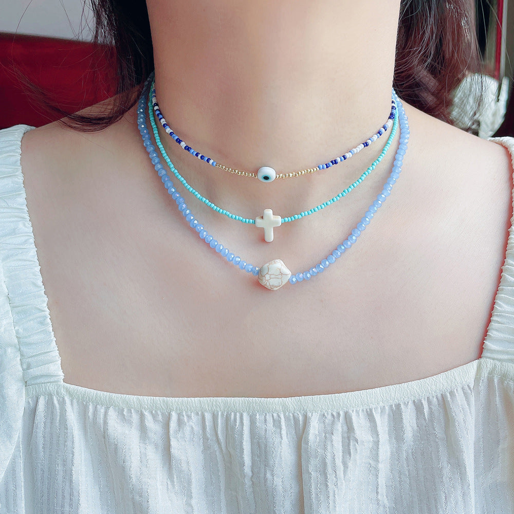 Wholesale Glass Blue Eyes Rice Beads Cross Layer Necklace