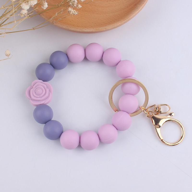 Llavero de muñeca de silicona de Pu Tassel al por mayor