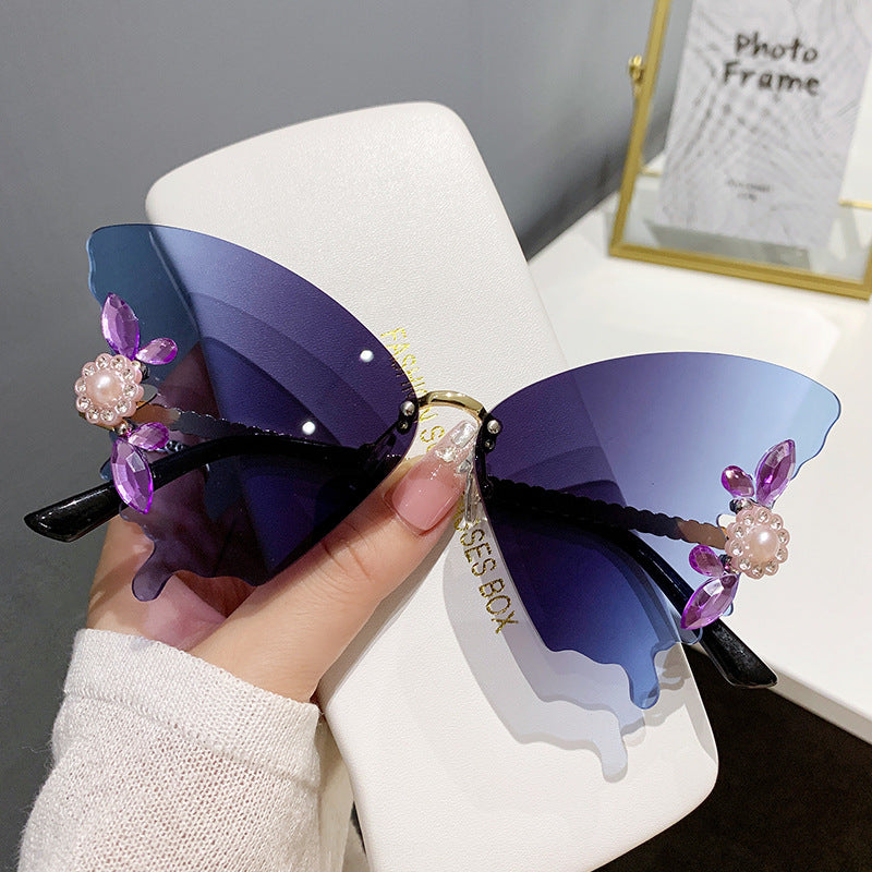 Wholesale Butterfly Diamond Rimless PC Sunglasses