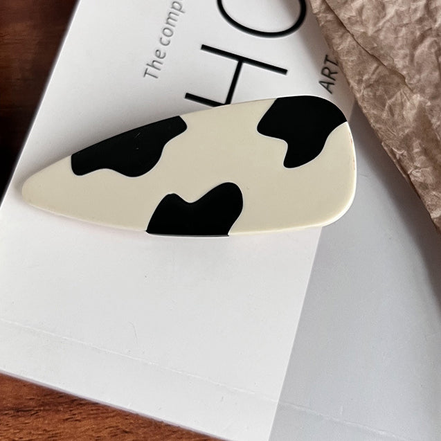 Horquillas para el cabello de acetato de oso toro blanco y negro al por mayor