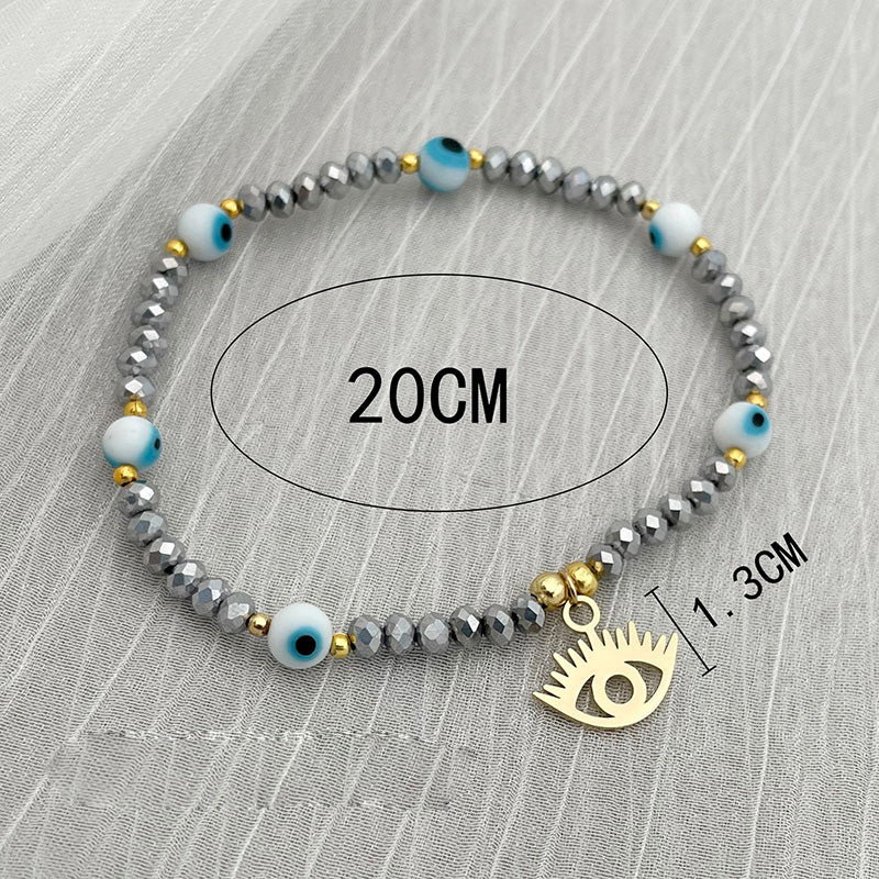 Venta al por mayor Devil's Eye Mother of Pearl Crystal 18K Gold Titanium Steel Bracelet OLY-BT-QinL002