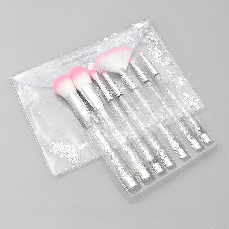Plastic al por mayor de 7 piezas Mango de partícula de cristal transparente Juego de cepillo de maquillaje