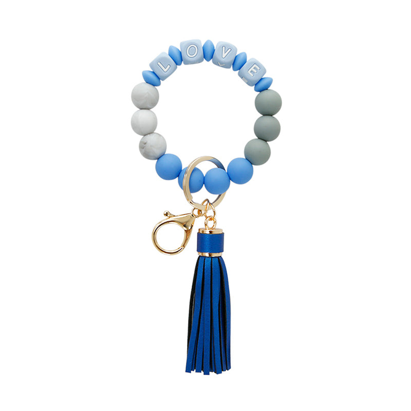 Venta al por mayor Alfabeto Epoxi Cuenta de silicona Llavero de muñeca Borla de cuero OLY-KC-JM002