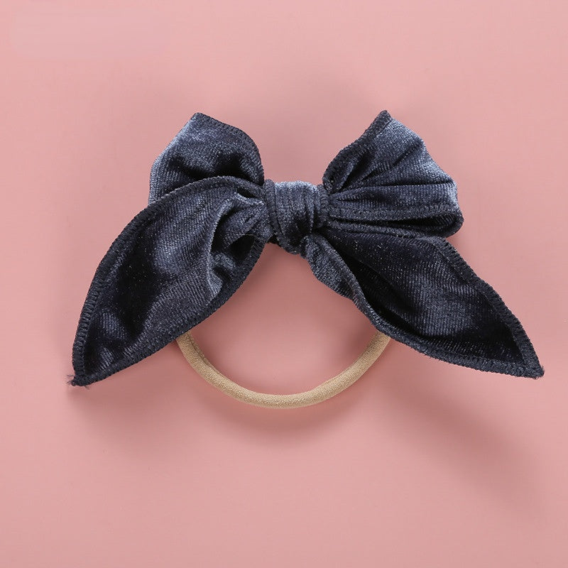 Venda al por mayor lazo elástico del pelo del tocado del arco del terciopelo