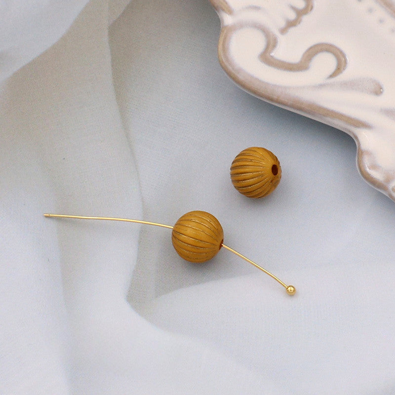 Wholesale of 10PCS Vintage Gold Relief Patterned Plastic Beads