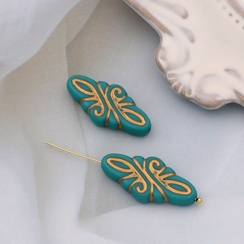 Wholesale of 10PCS Vintage Gold Relief Patterned Plastic Beads