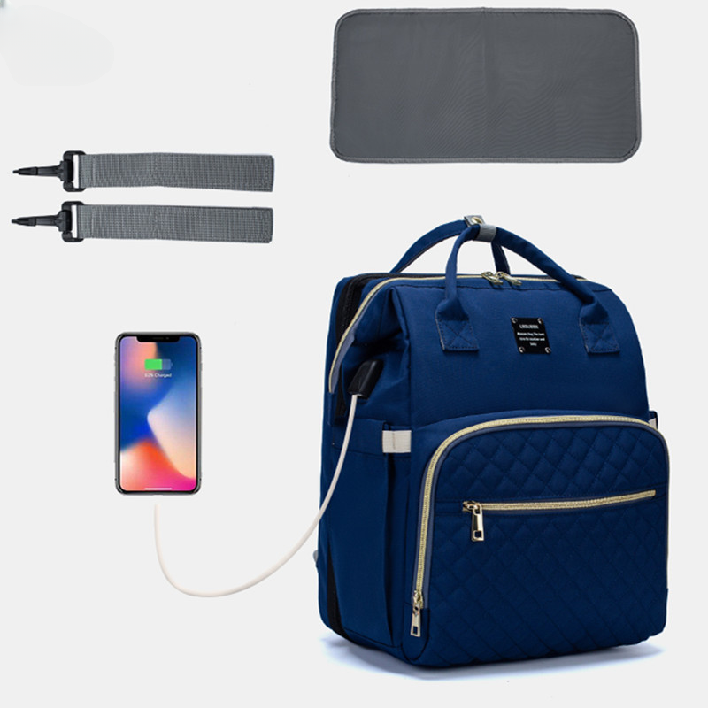 Venta al por mayor bolsa de momia de cuna plegable portátil de tela Oxford