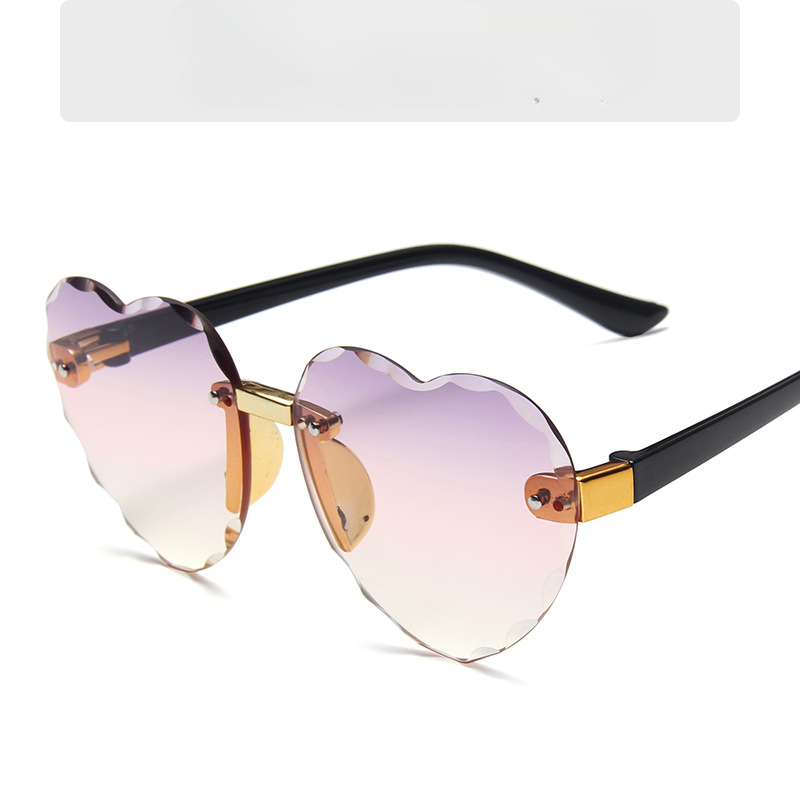 Gafas de sol para niños con diseño de corazón de melocotón degradado sin marco para PC al por mayor