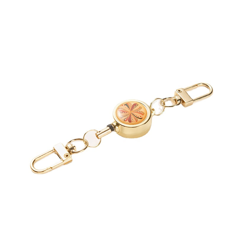 Wholesale Metal Flower Crystal Retractable Breast Tag Pull Button Keychain